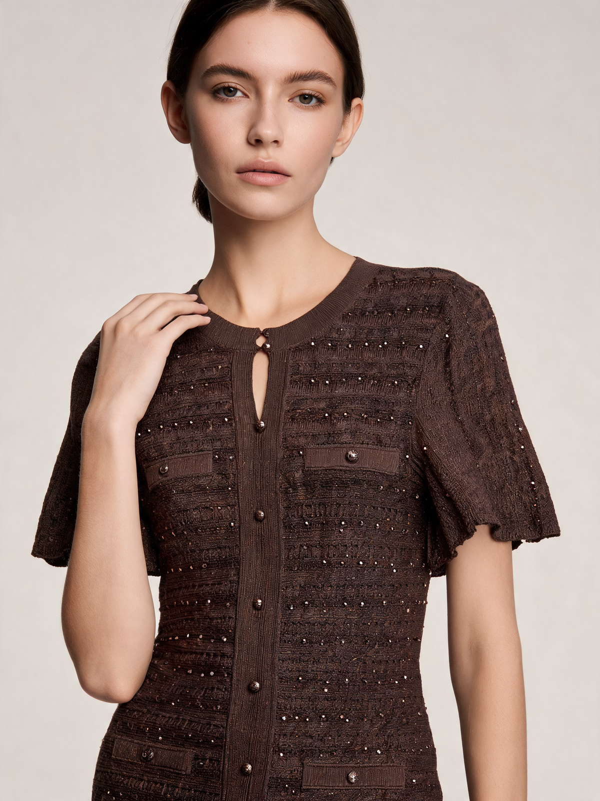 Brown knitted dress close-up view