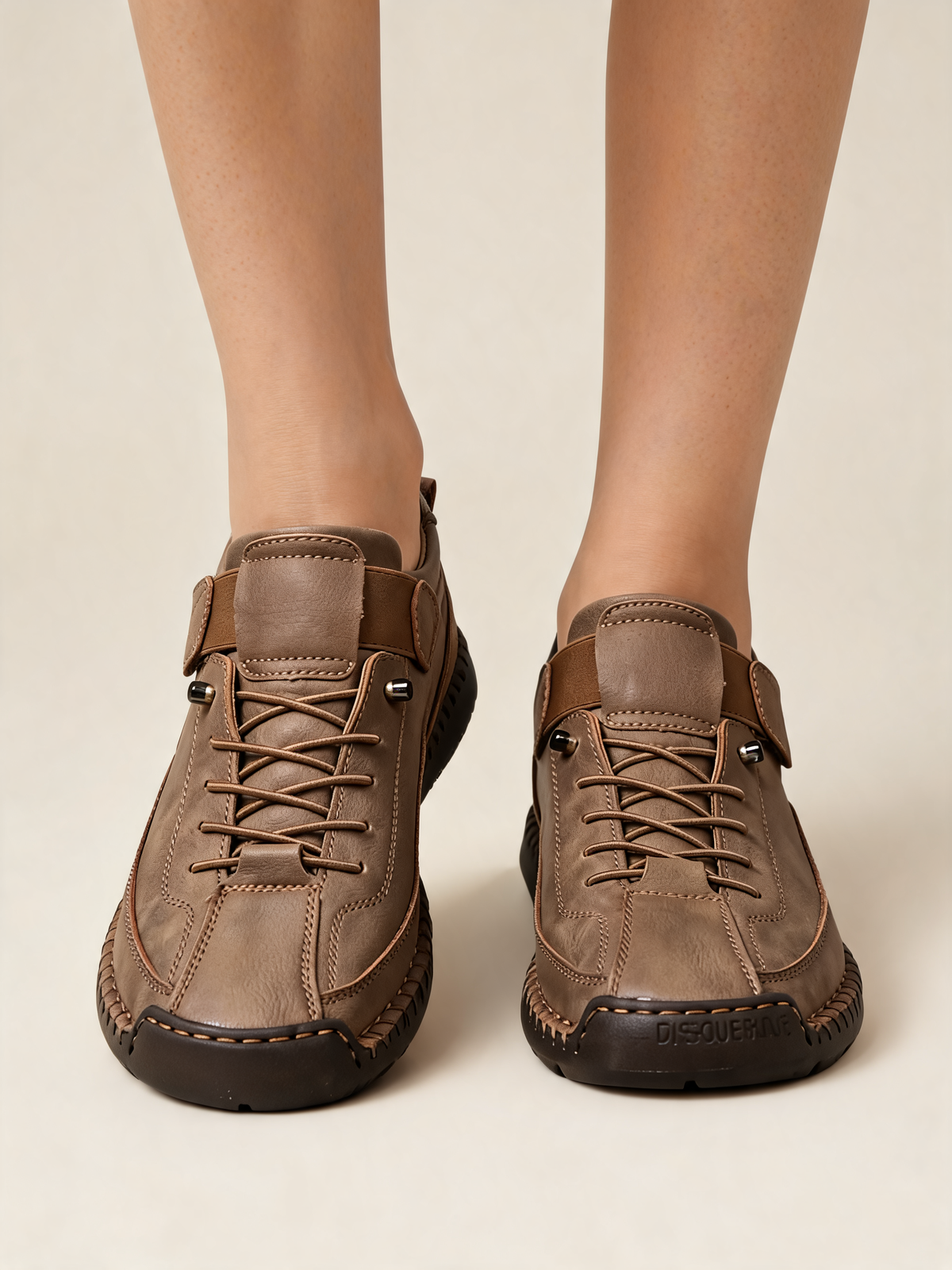 Taupe women's trainers close-up