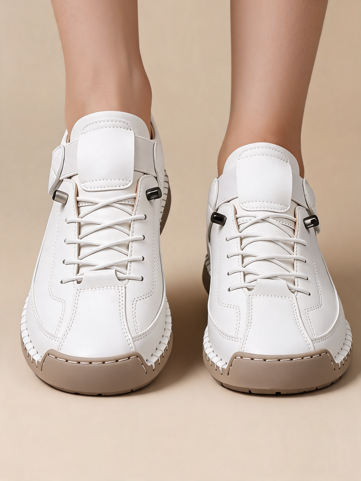 White women's trainers close-up