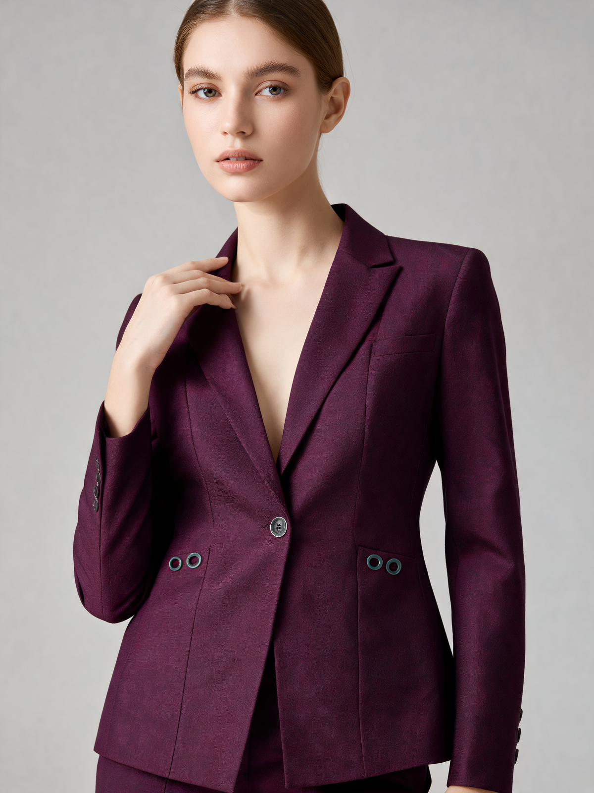 Plum women's suit close-up