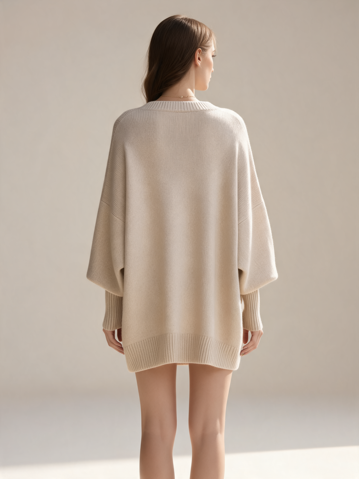 Cream women's jumper back view