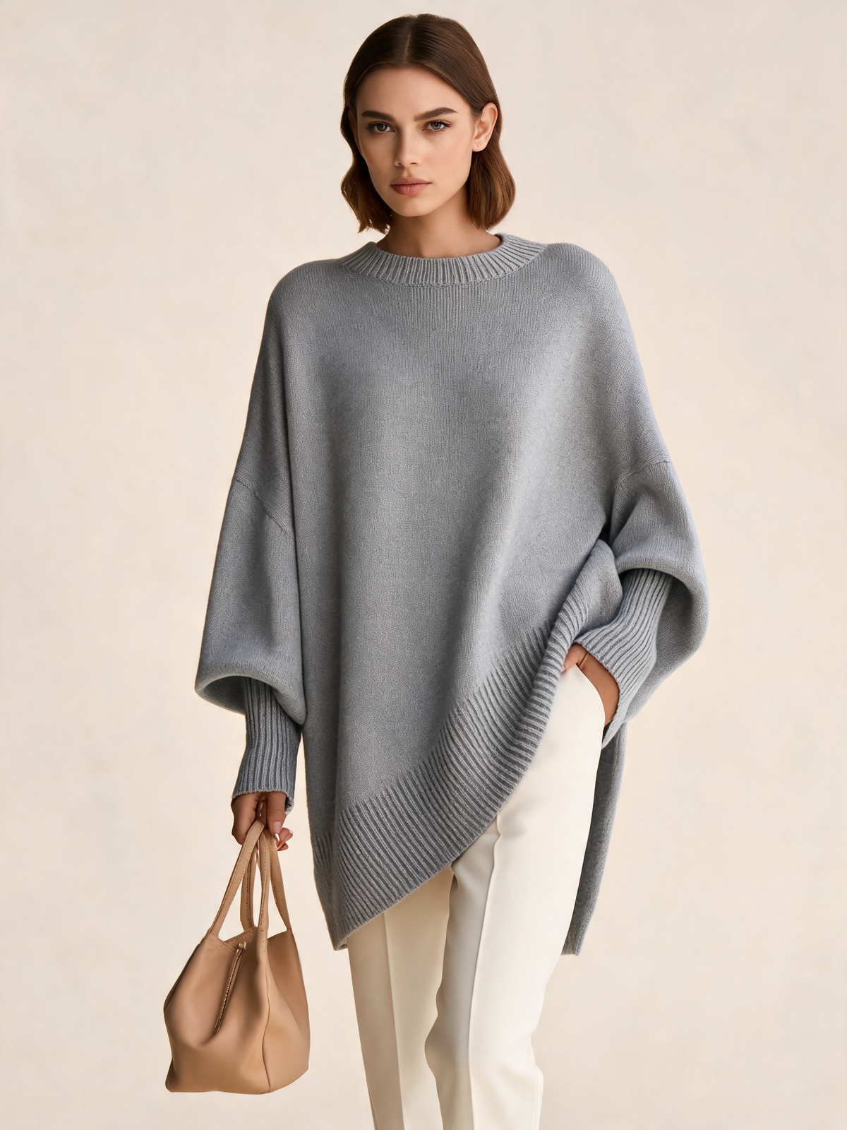 Grey women's jumper three-quarter view