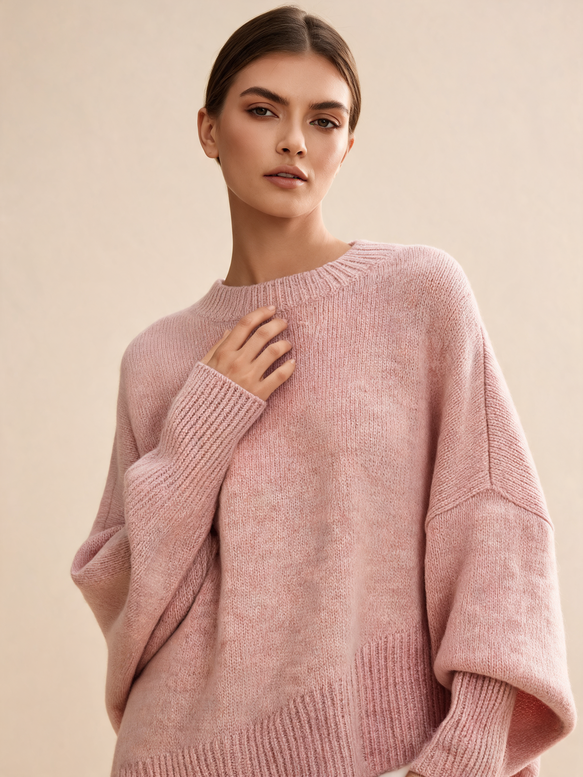 Pink women's jumper close-up
