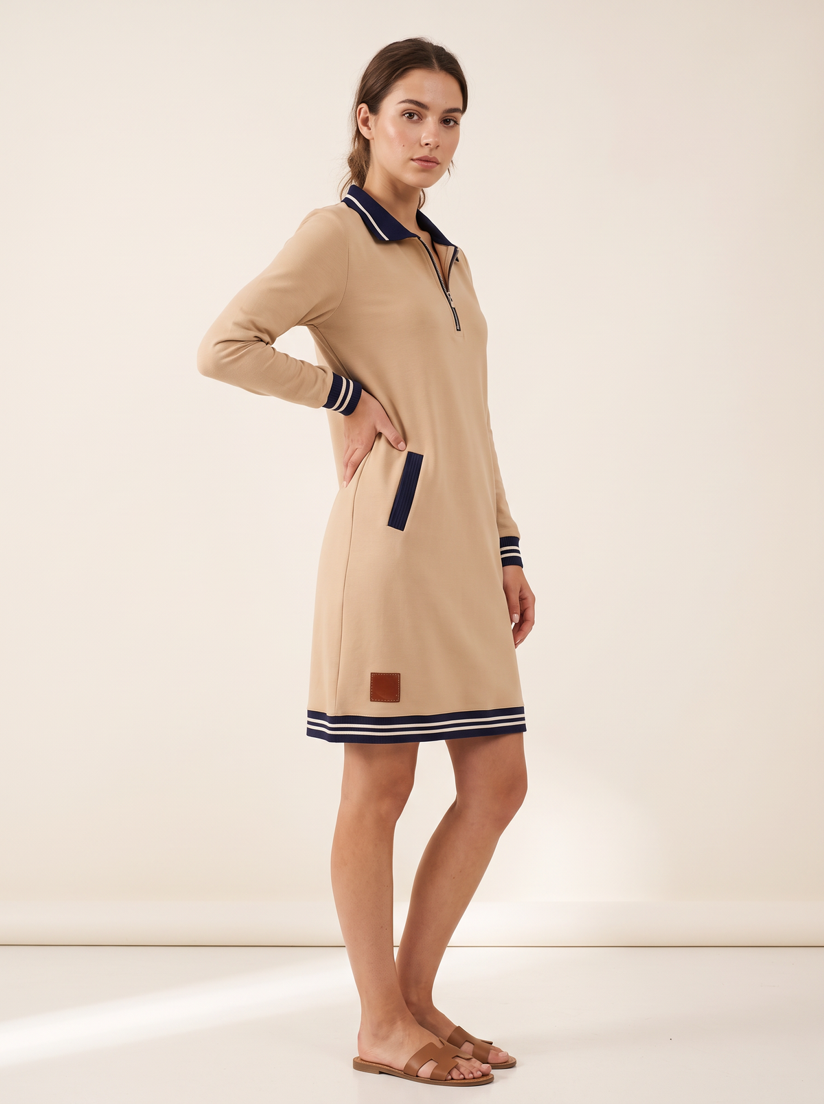 Beige long sleeve dress 3/4 front view