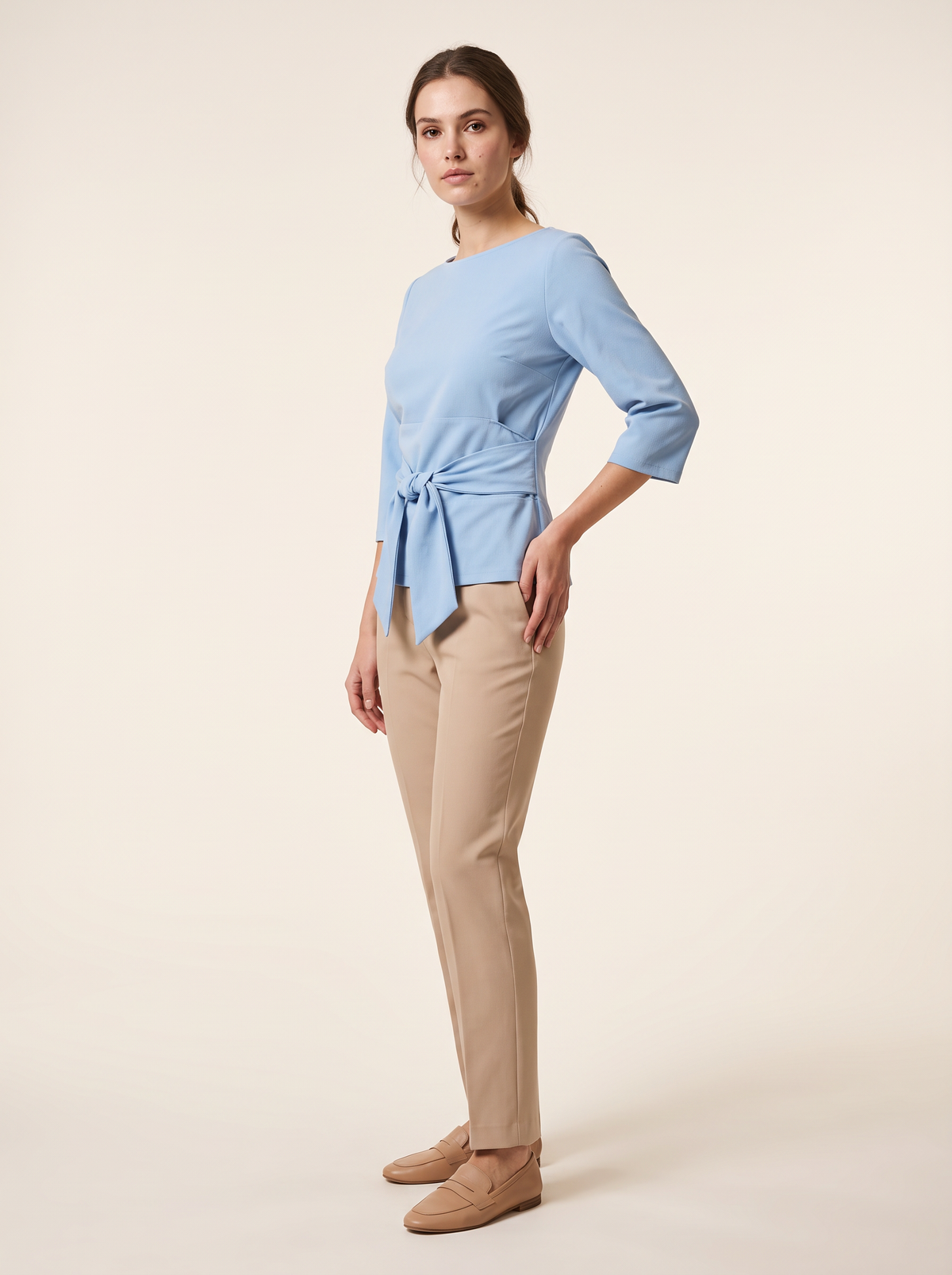 Light blue blouse tie waist bow front view