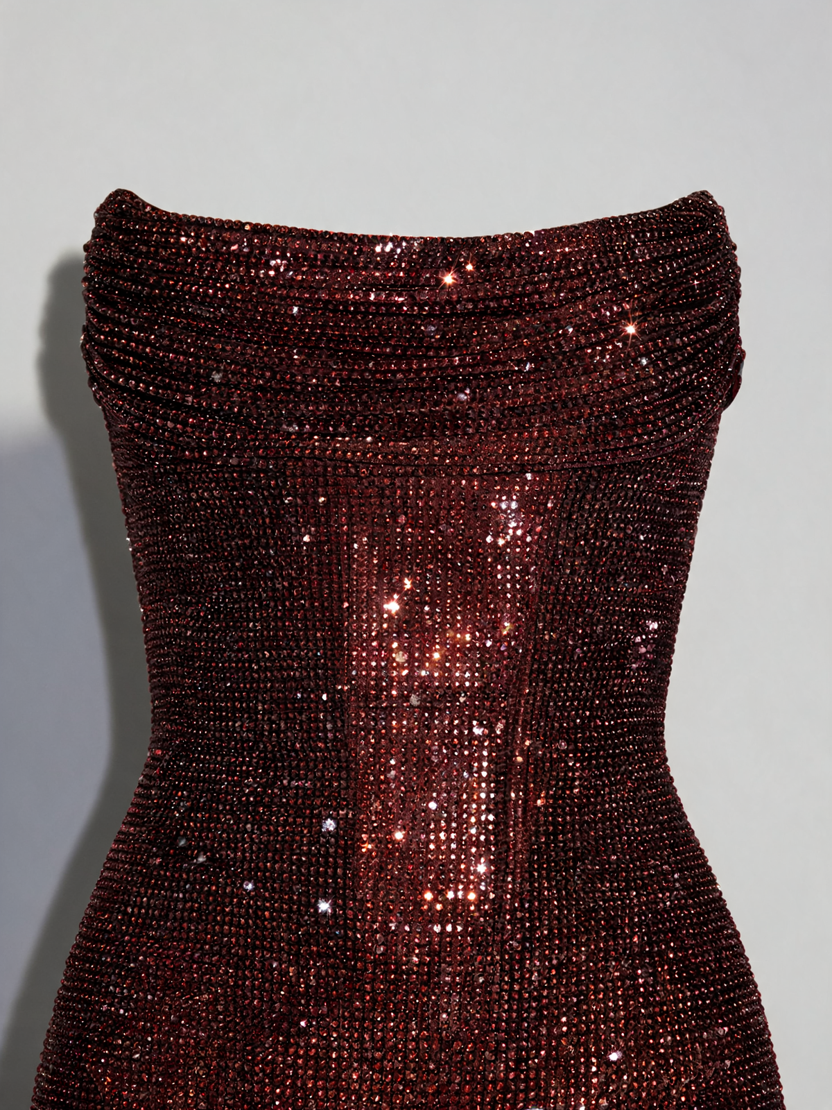 Plum brown party dress, close-up of draped neckline and rhinestones