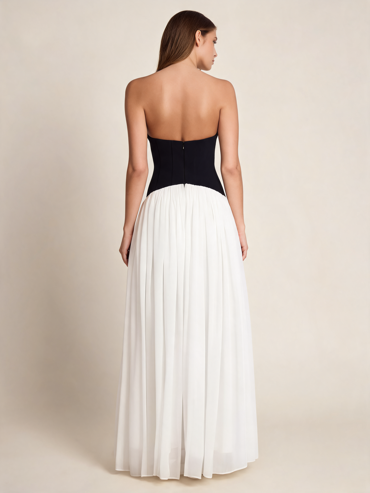 White halterneck party dress with black waist, back view