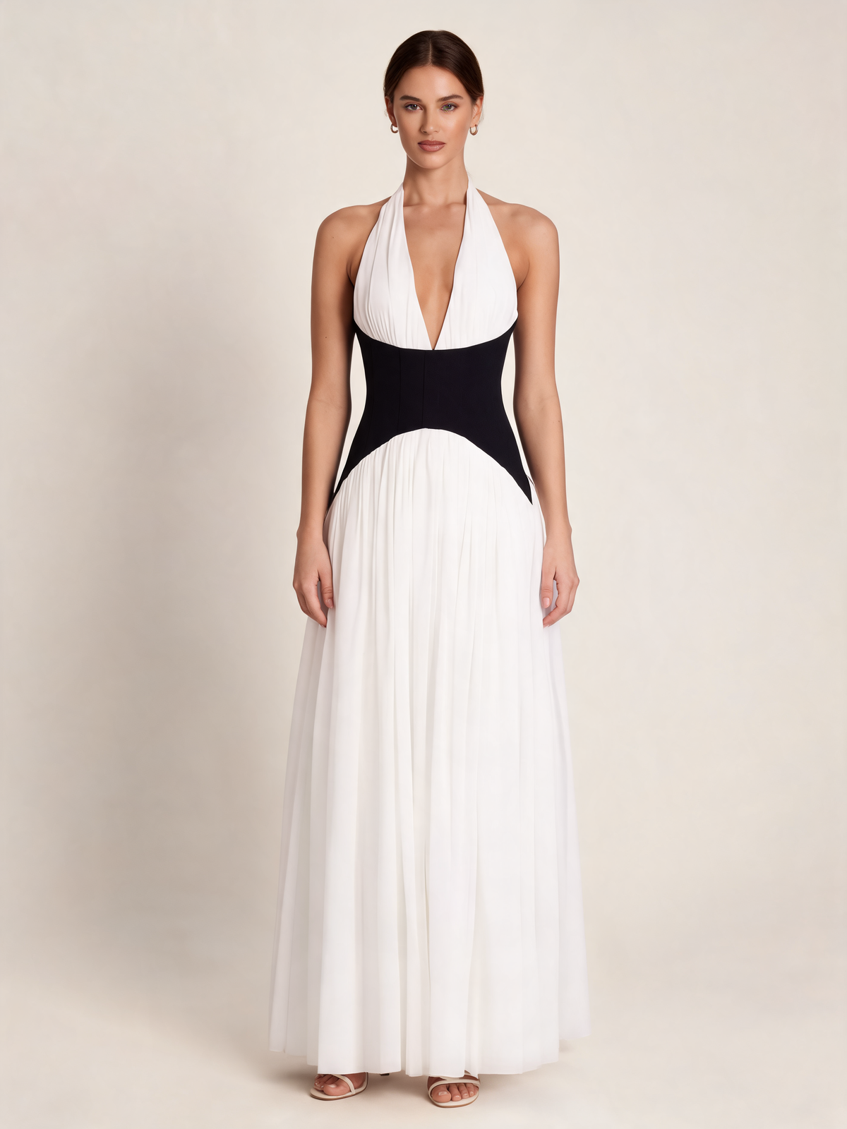 White halterneck party dress with black waist, front view