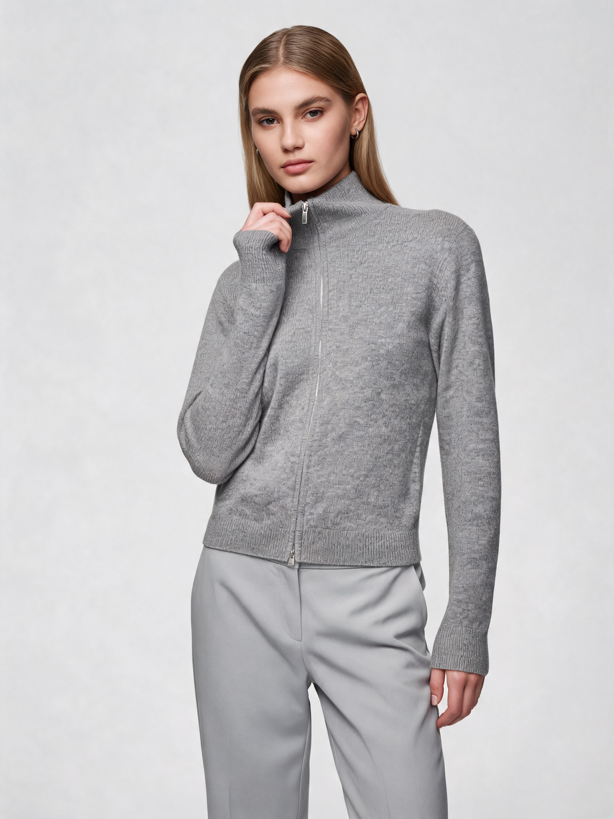 Grey zip-up cardigan, three-quarter view