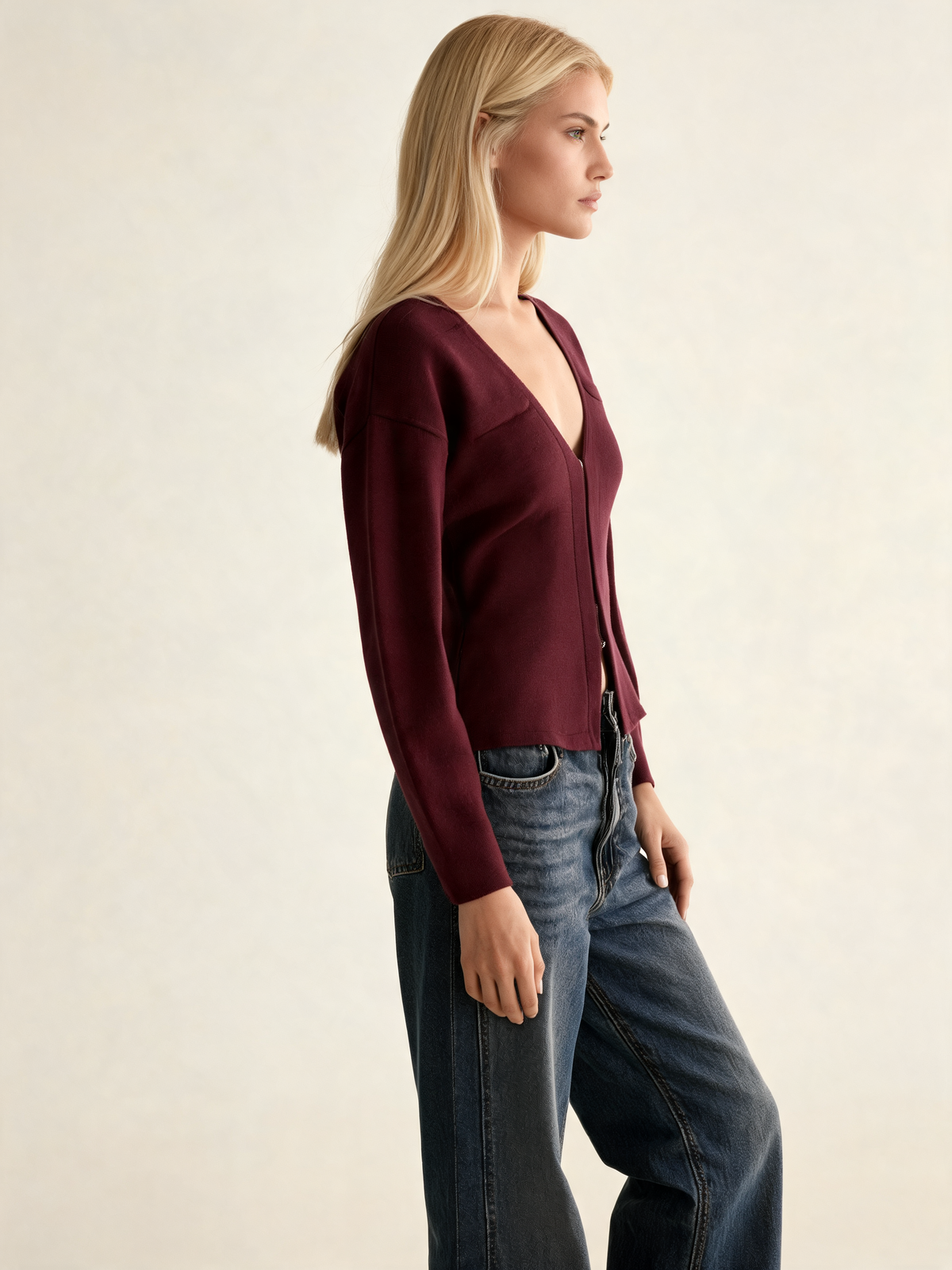 Burgundy fitted cardigan, side view
