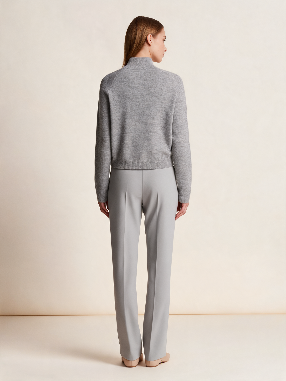 Grey zip-up cardigan, back view