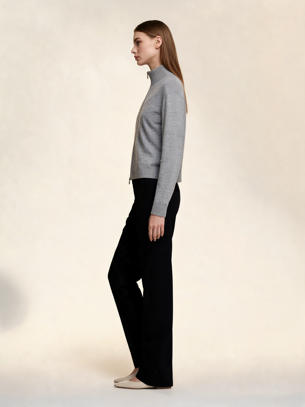 Grey zip-up cardigan, side view