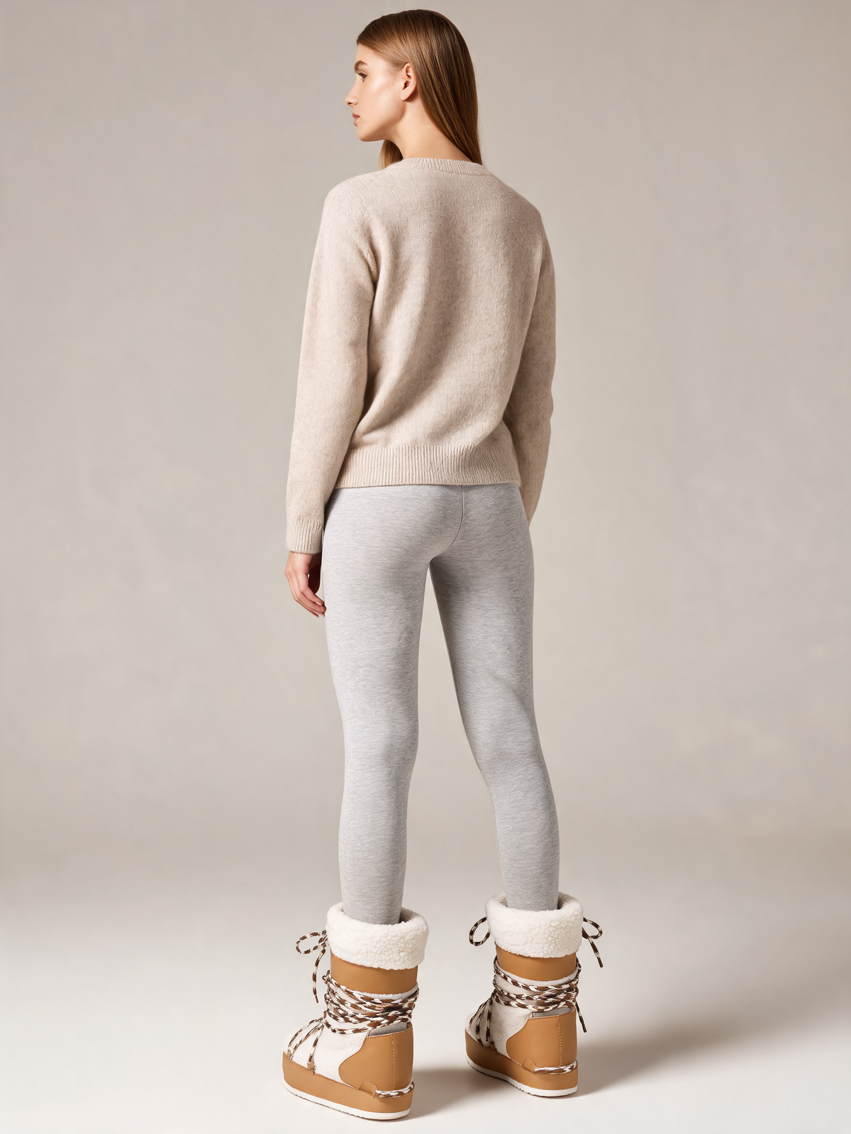 Cream and tan snow boots back view