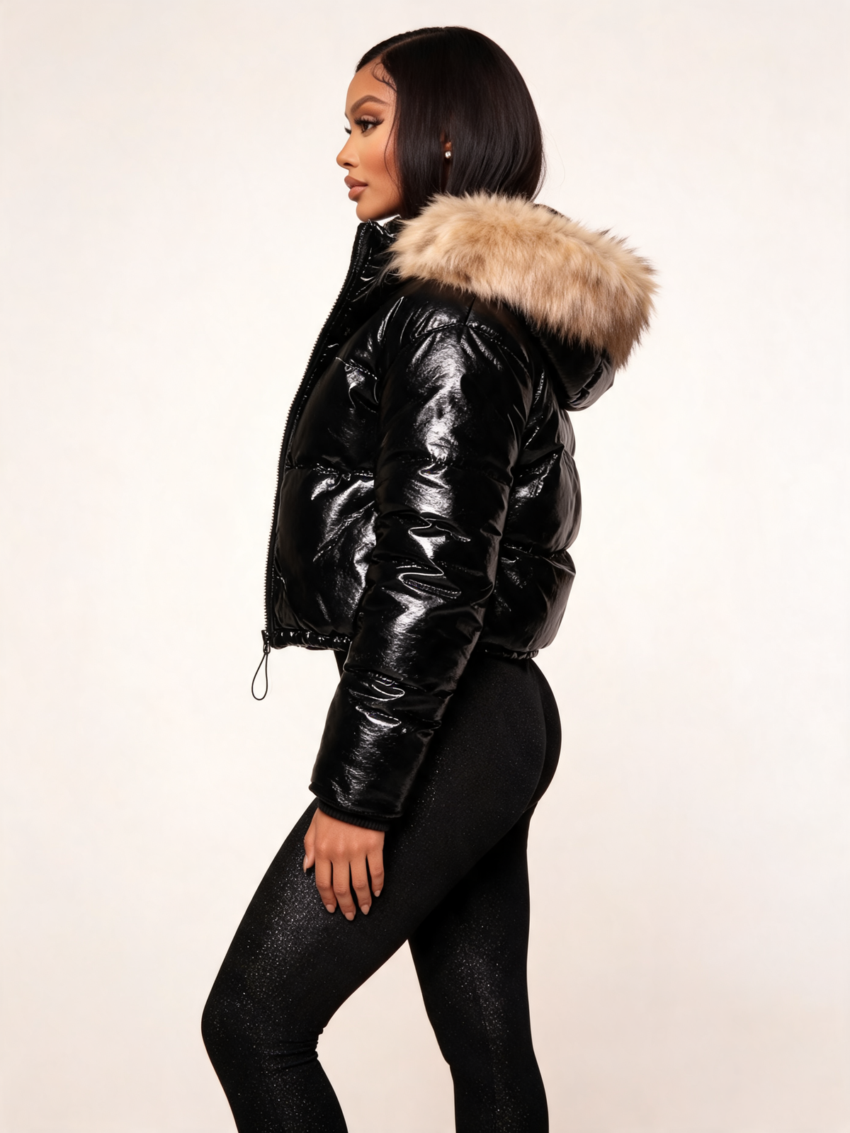 Black puffer jacket women side view