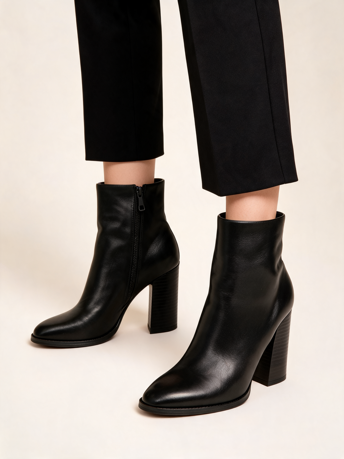 Black ankle boots three-quarter view