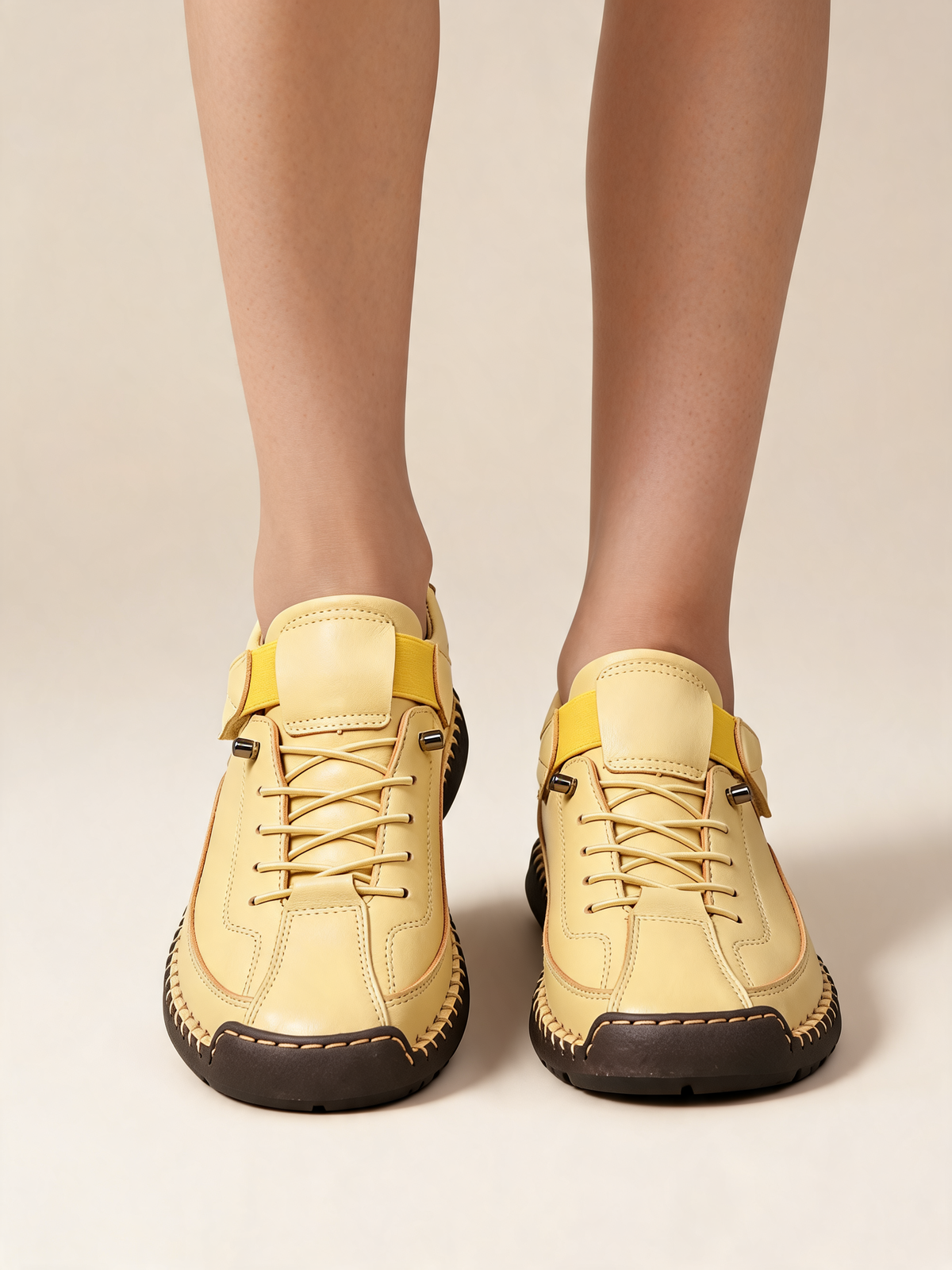 Yellow women's trainers close-up