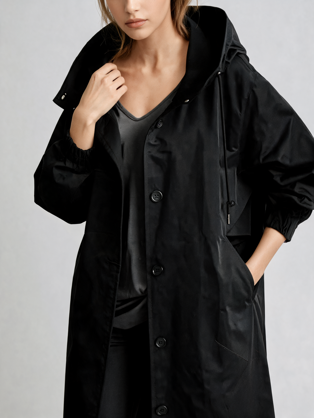 Black trench coat close-up