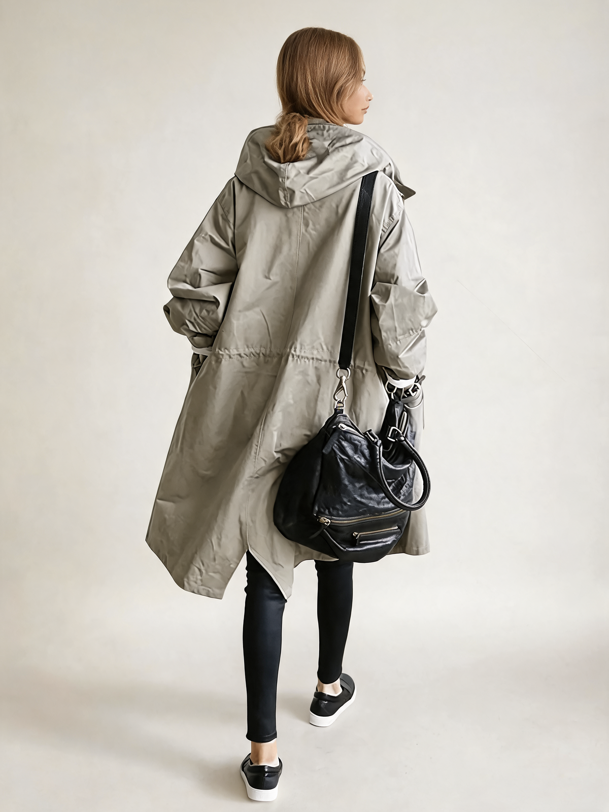 Grey trench coat back view
