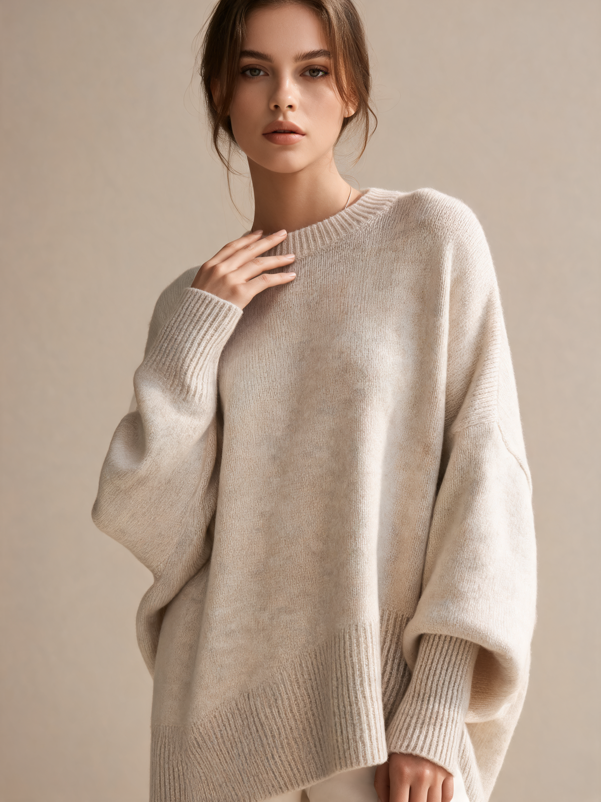 Cream women's jumper close-up