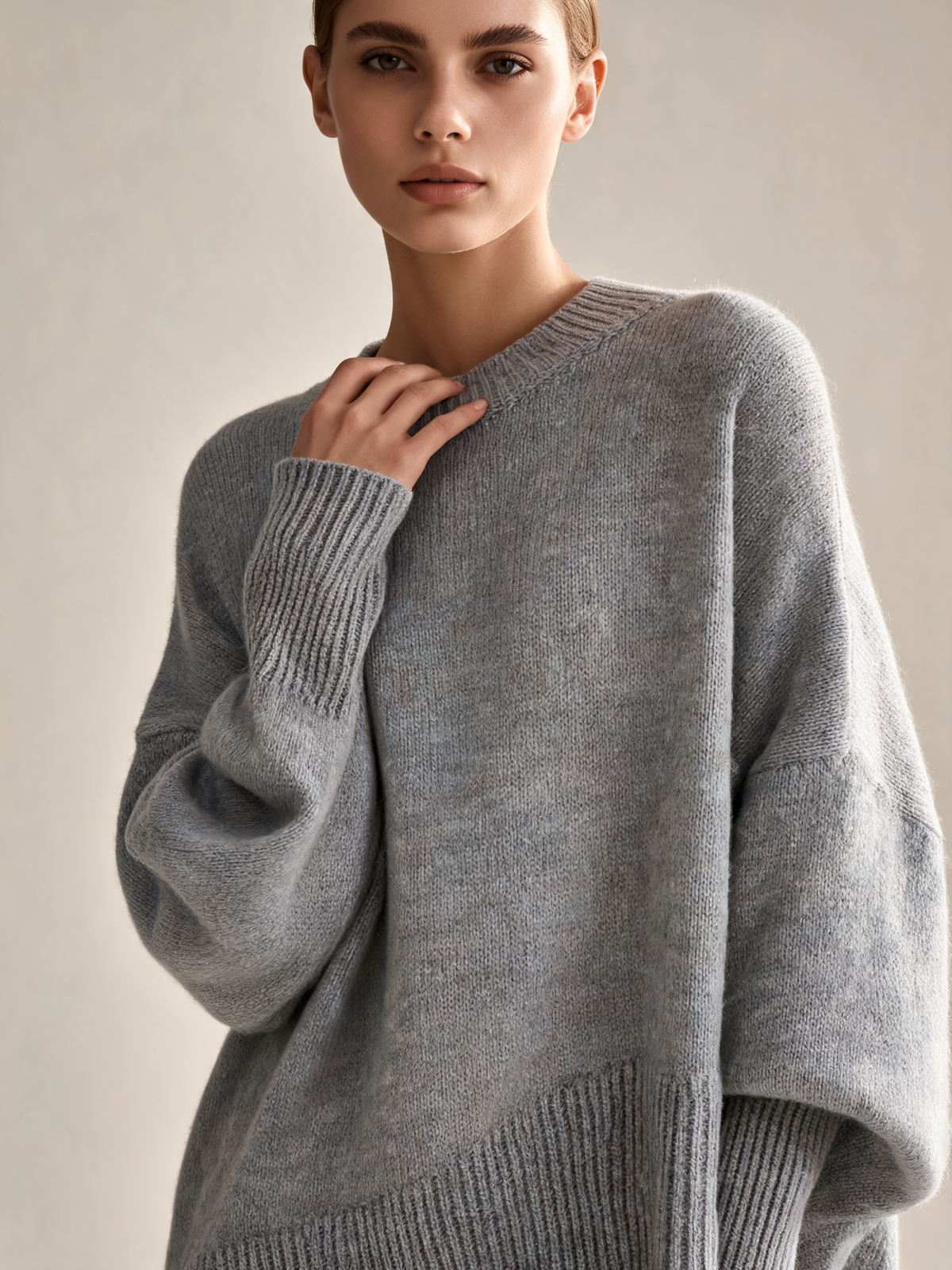 Grey women's jumper close-up