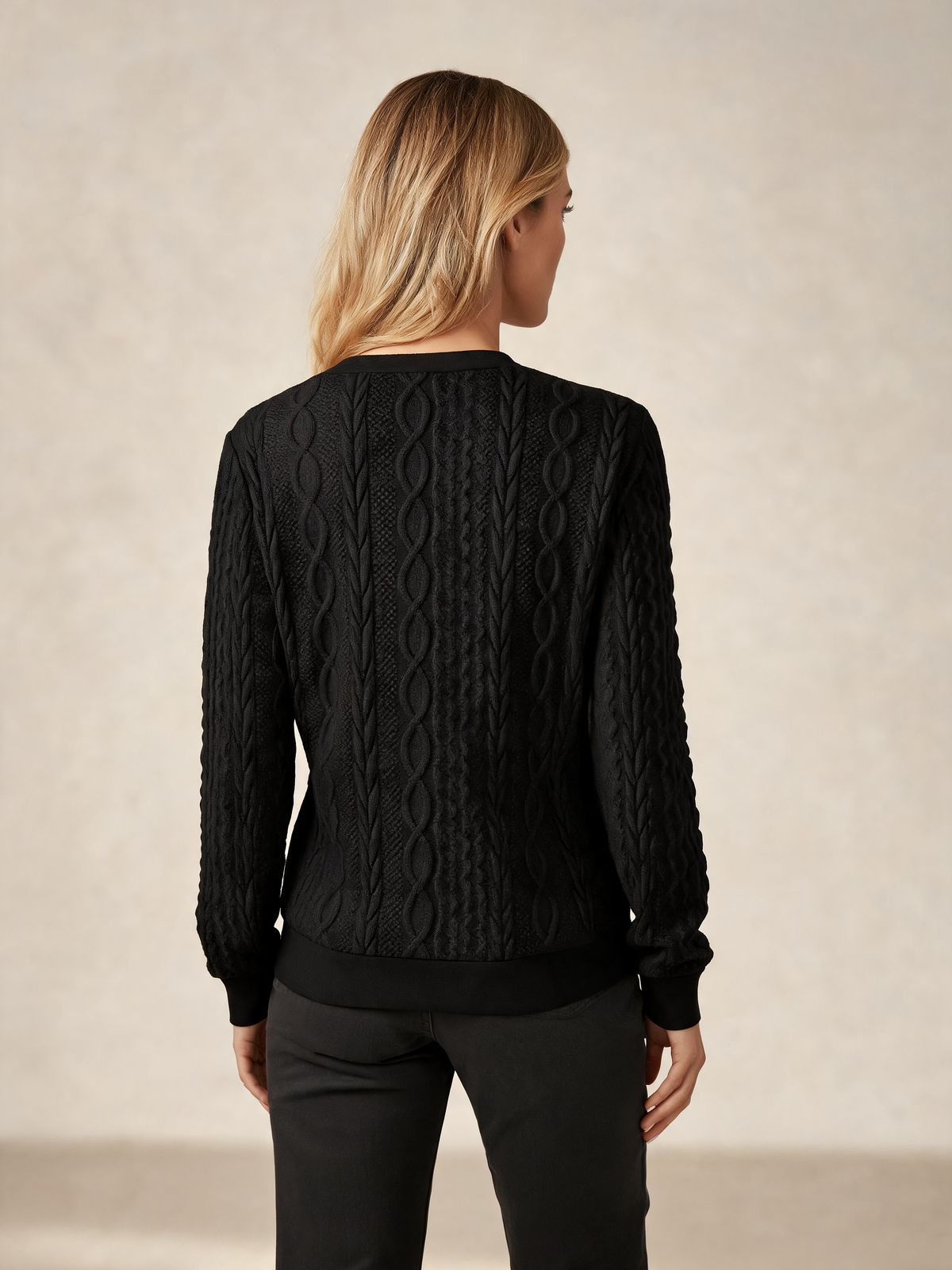 Black knitted jumper back view