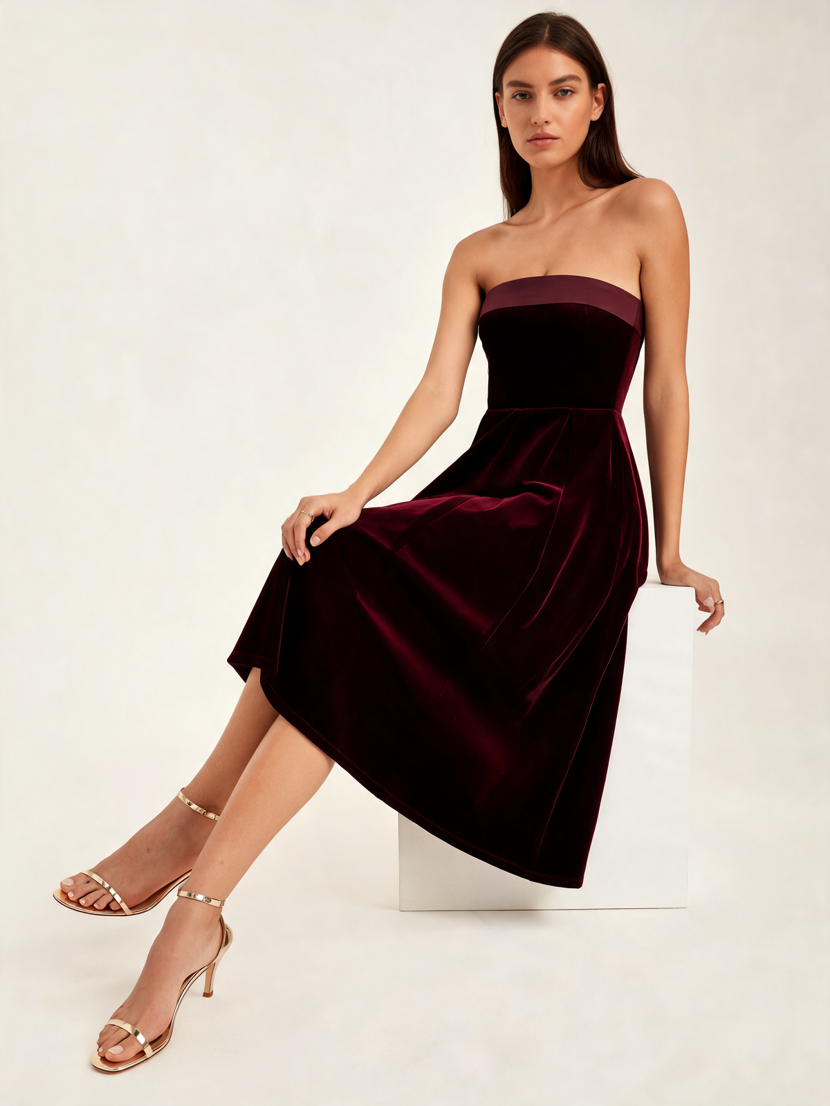 Burgundy christmas party dress seated view