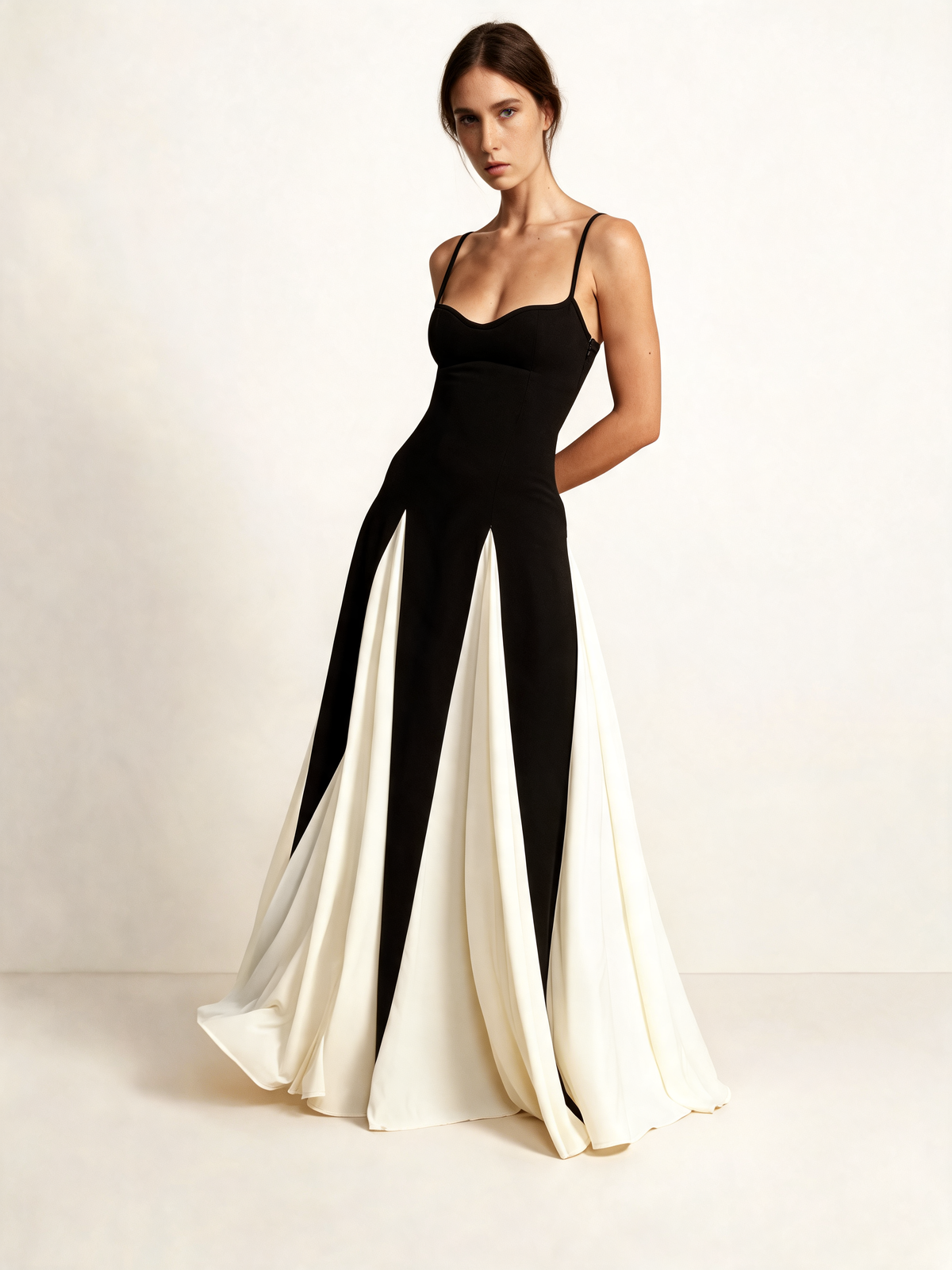 Black and cream evening dress walking view