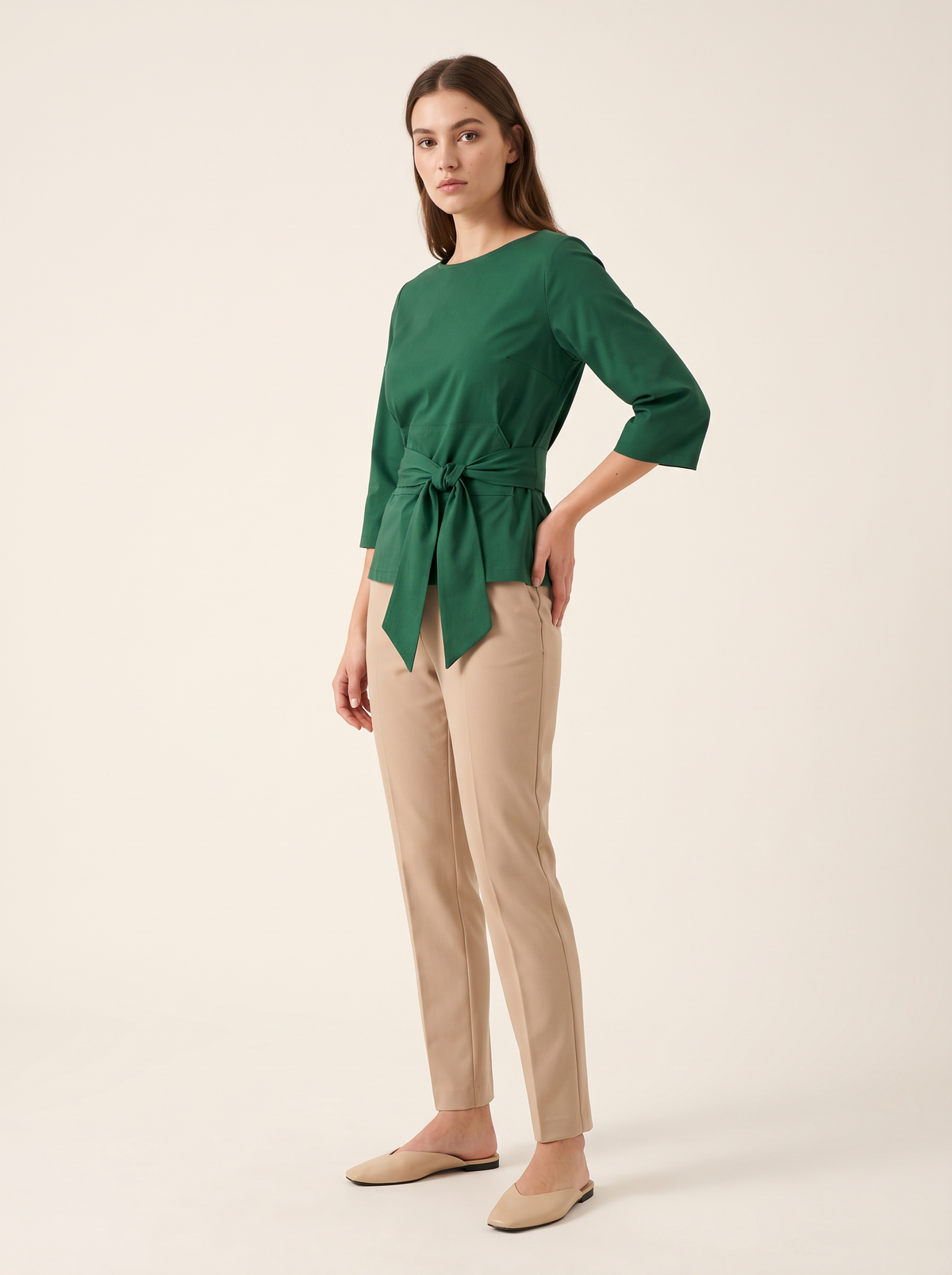 Green blouse tie waist bow front view